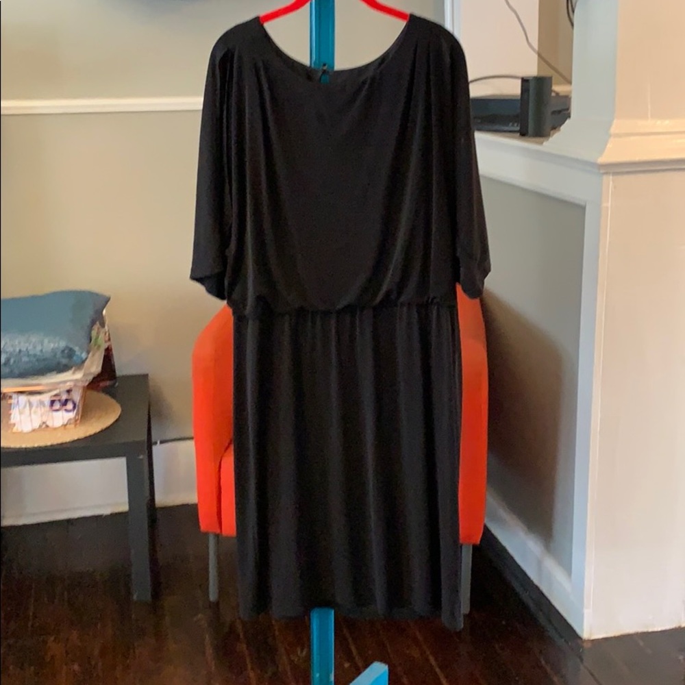 Black formal dress with slits on the arms